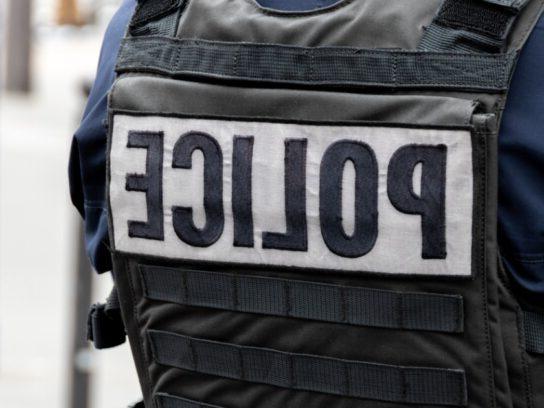 photo of police officer in bulletproof vest